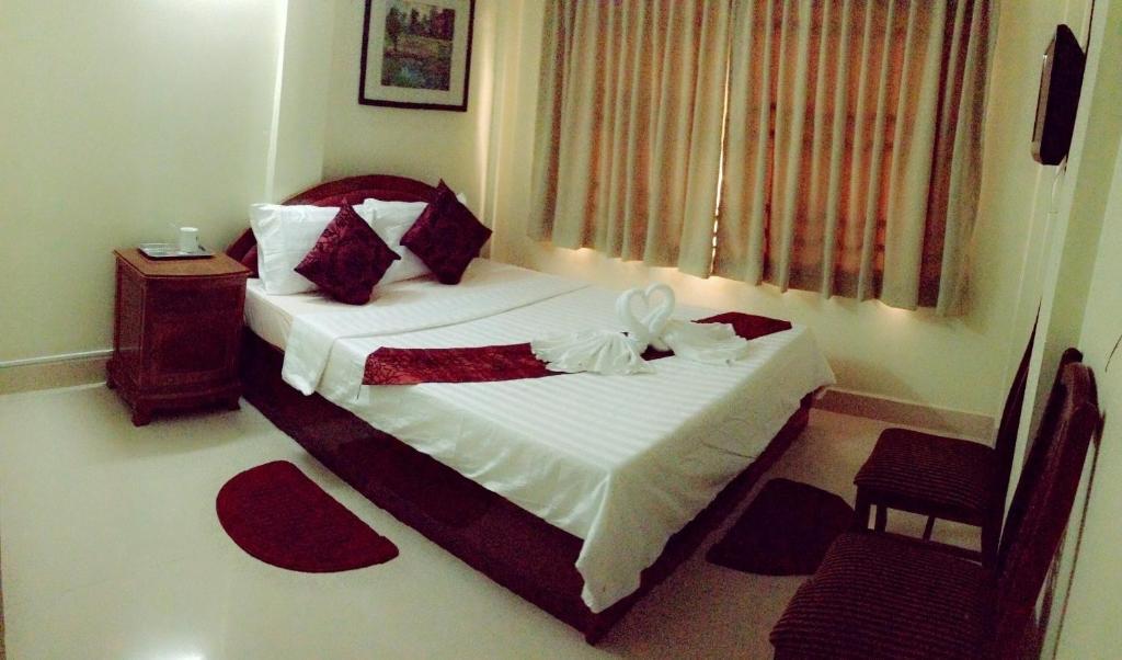 Homeland Guesthouse Phnom Penh Chambre photo