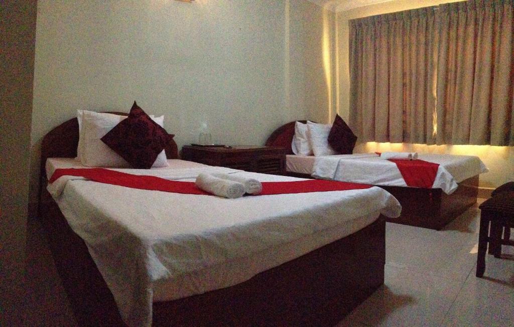 Homeland Guesthouse Phnom Penh Chambre photo