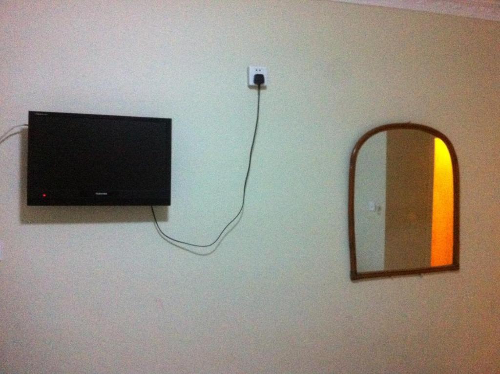Homeland Guesthouse Phnom Penh Chambre photo